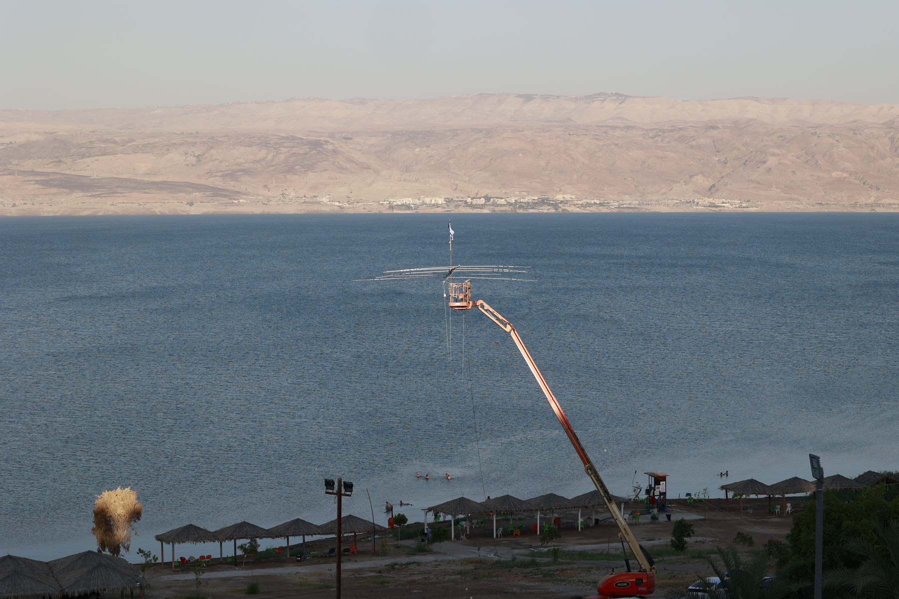 Israeli flag mounted beside a portable amateur radio antenna