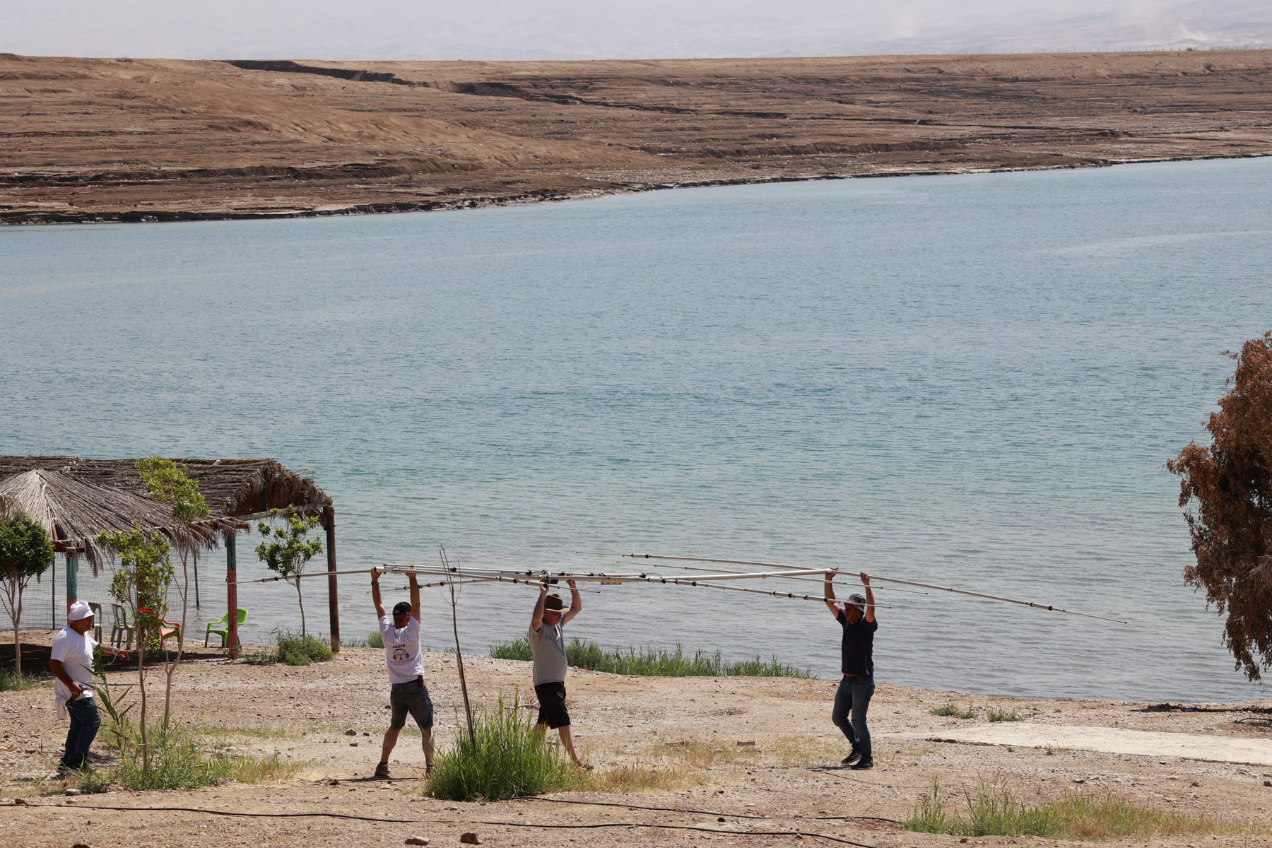 Amateur radio operators setting up portable antennas at the Dead Sea