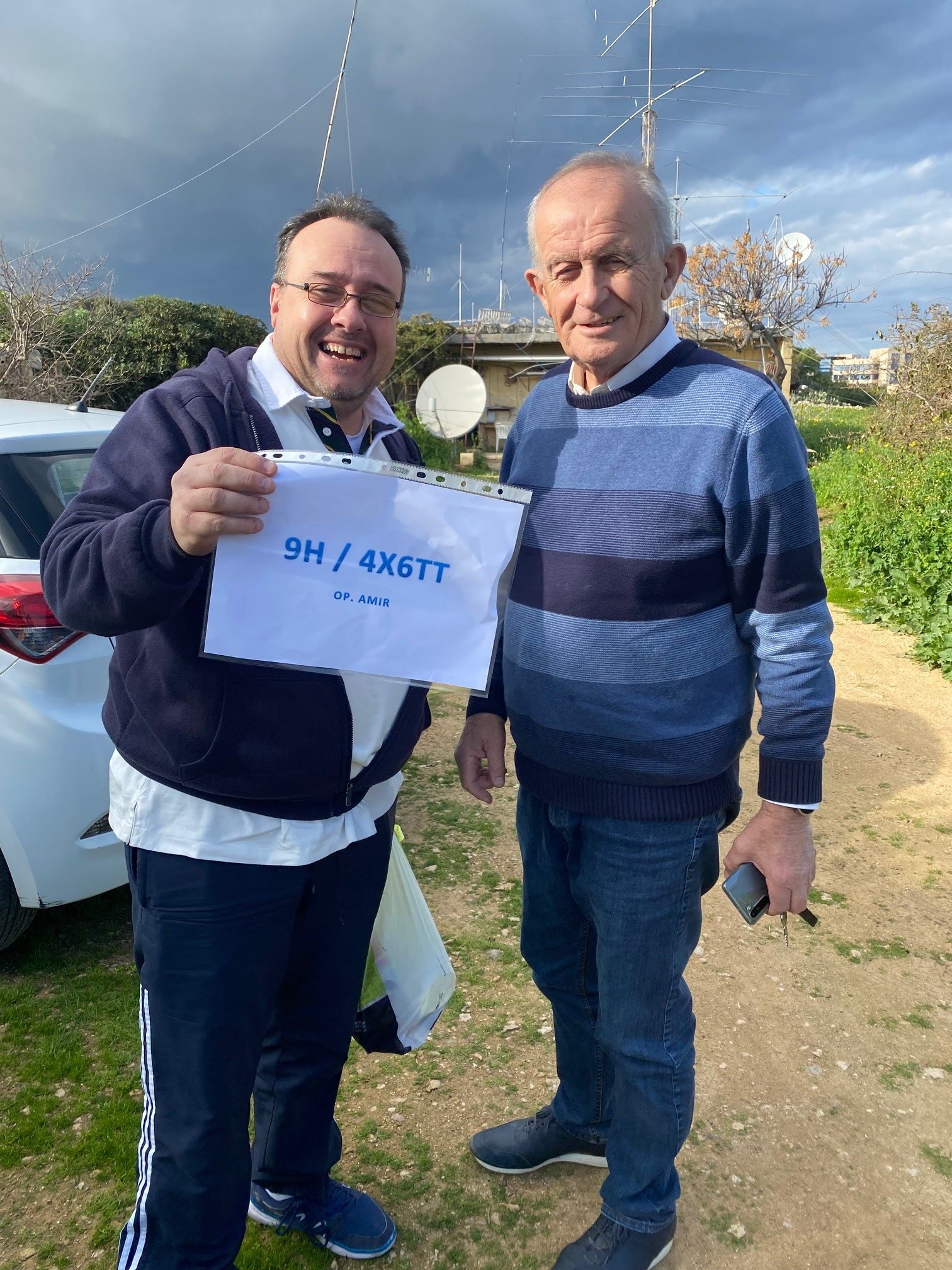 Amateur radio operators with a 9H slash 4X6TT sign